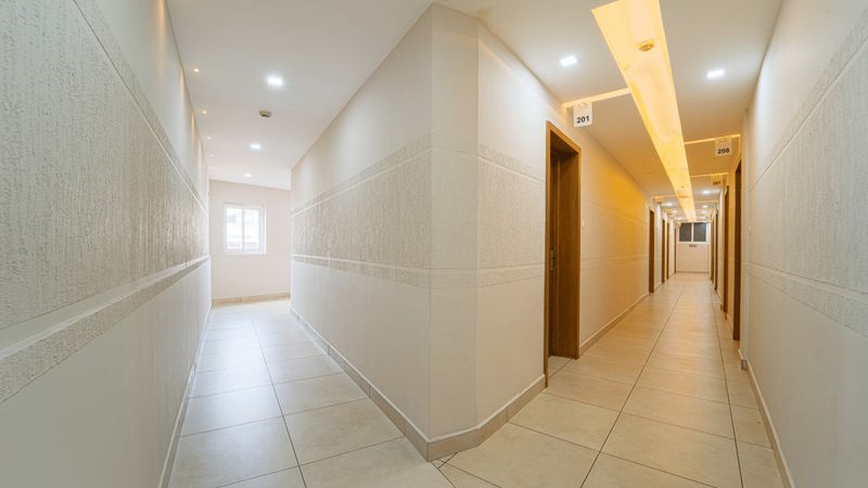 A bright guest-room corridor