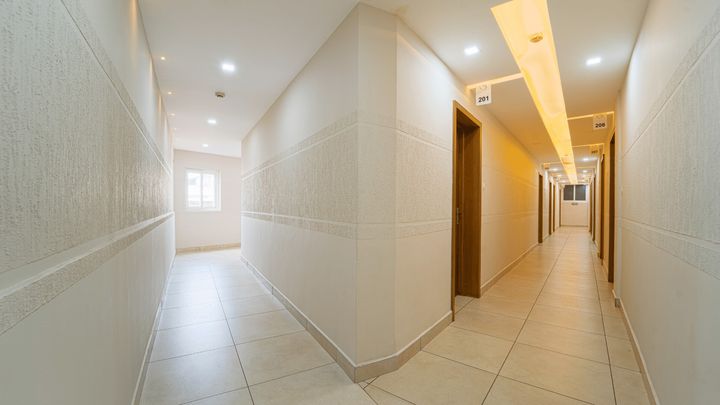 A bright guest-room corridor