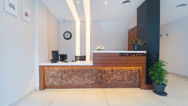 Reception desk with a carved stone counter