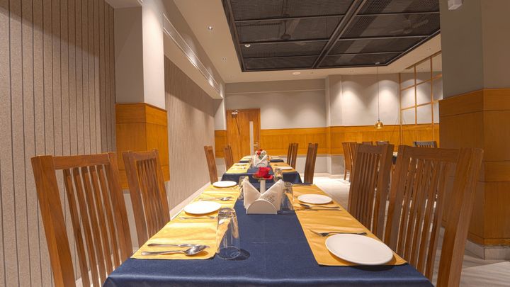 Set tables along the restaurant wall